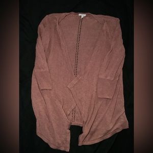 Maurice’s maroon cardigan